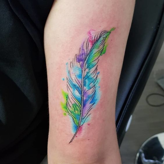 peacock quill pen tattoo