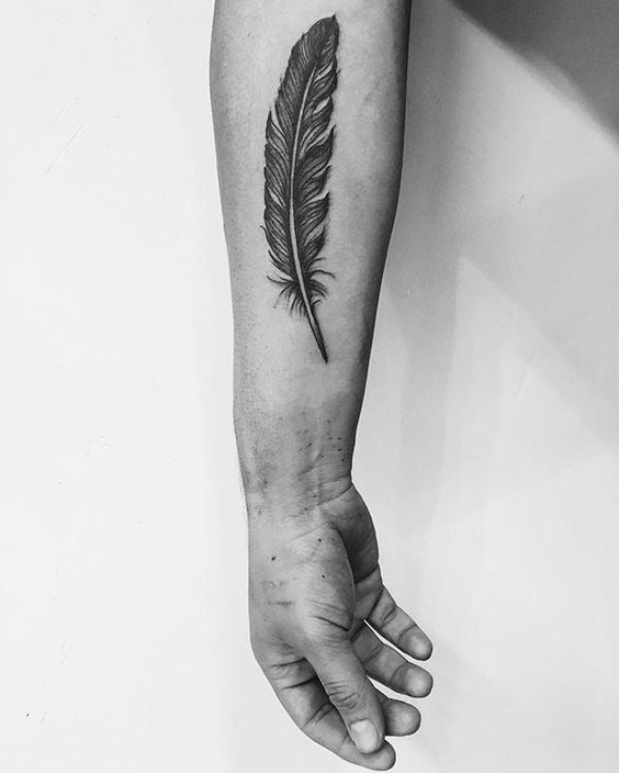 301 White Feather Tattoo Stock Photos HighRes Pictures and Images   Getty Images