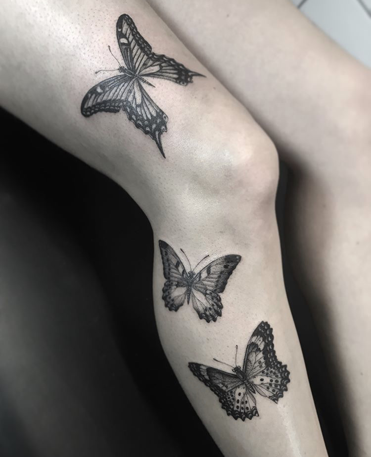 Butterfly and flower tattoo on the thigh  Tattoogridnet