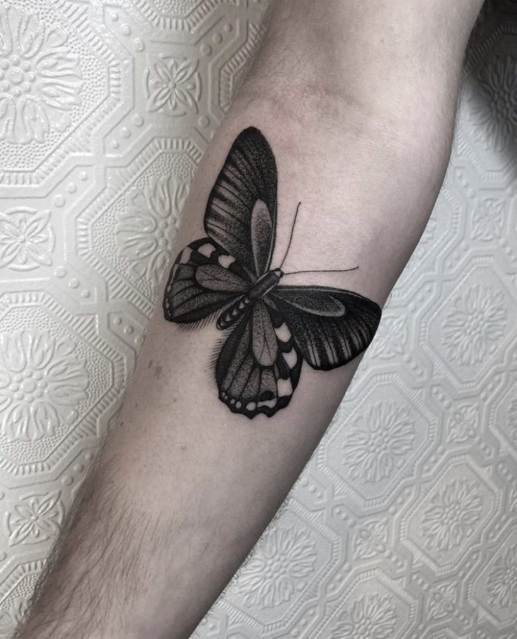 Black Butterfly on Arm Tattoo Idea