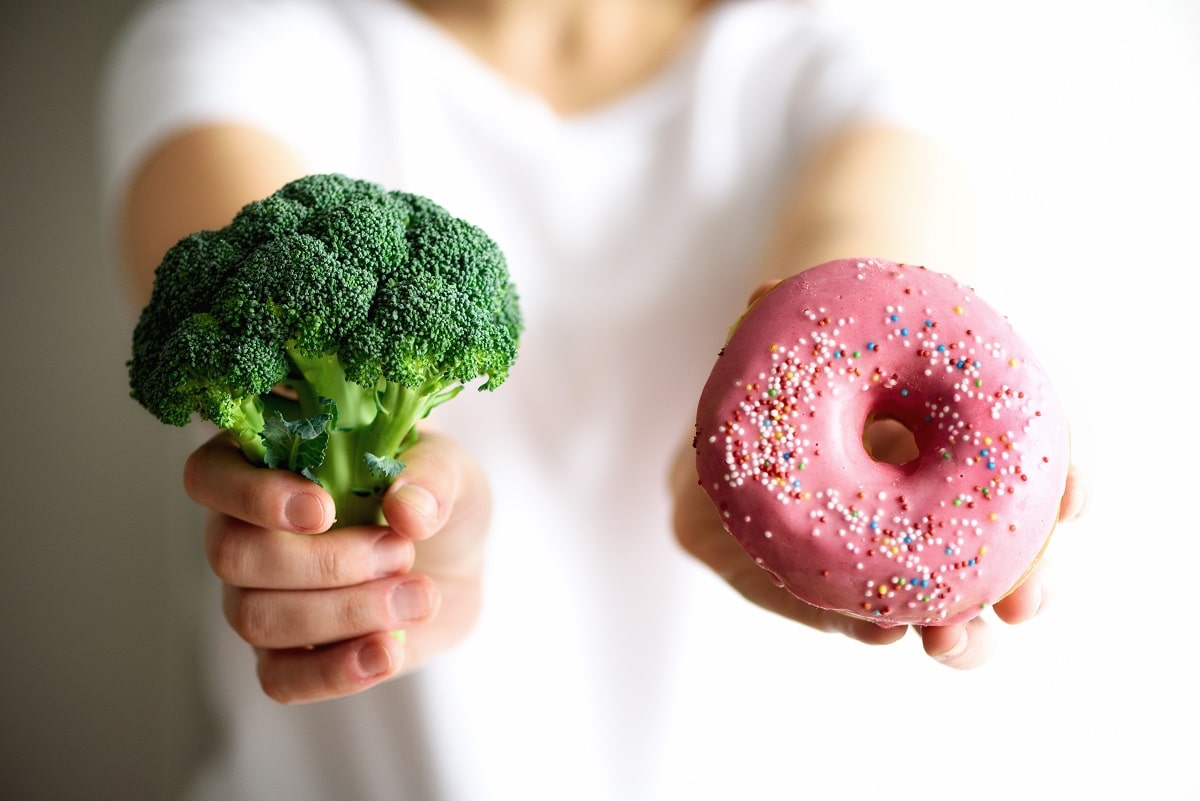choosing between broccoli or junk food