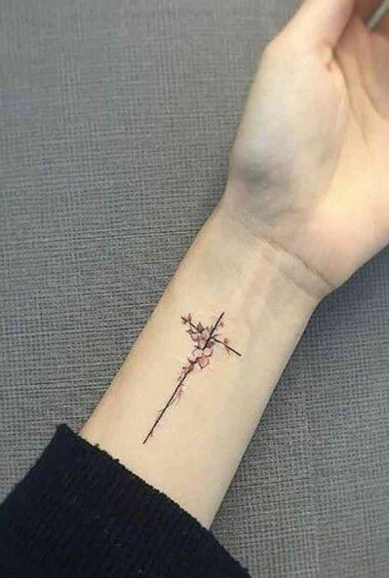 cross tattoo side wrist