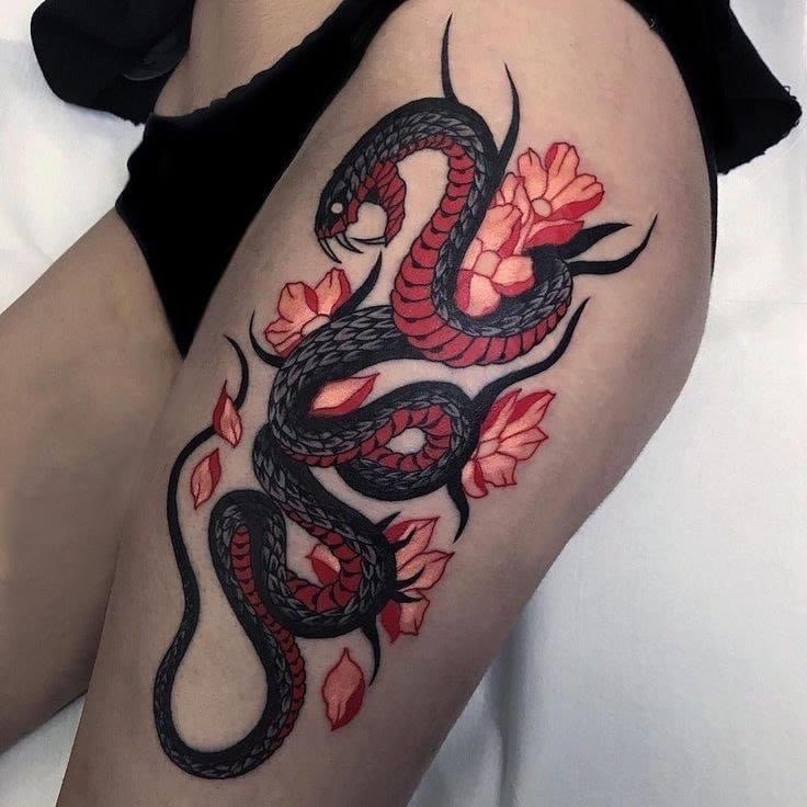 Snake tattoo on the hip