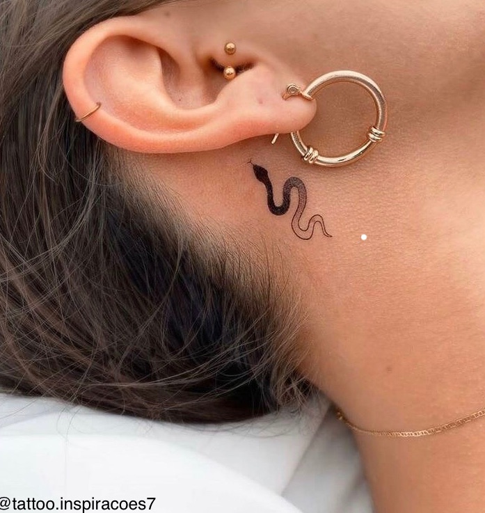 Keep it simple and get a simple snake tattoo