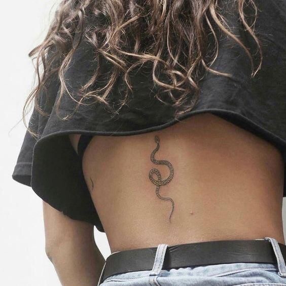 snake tattoo female backTikTok Search