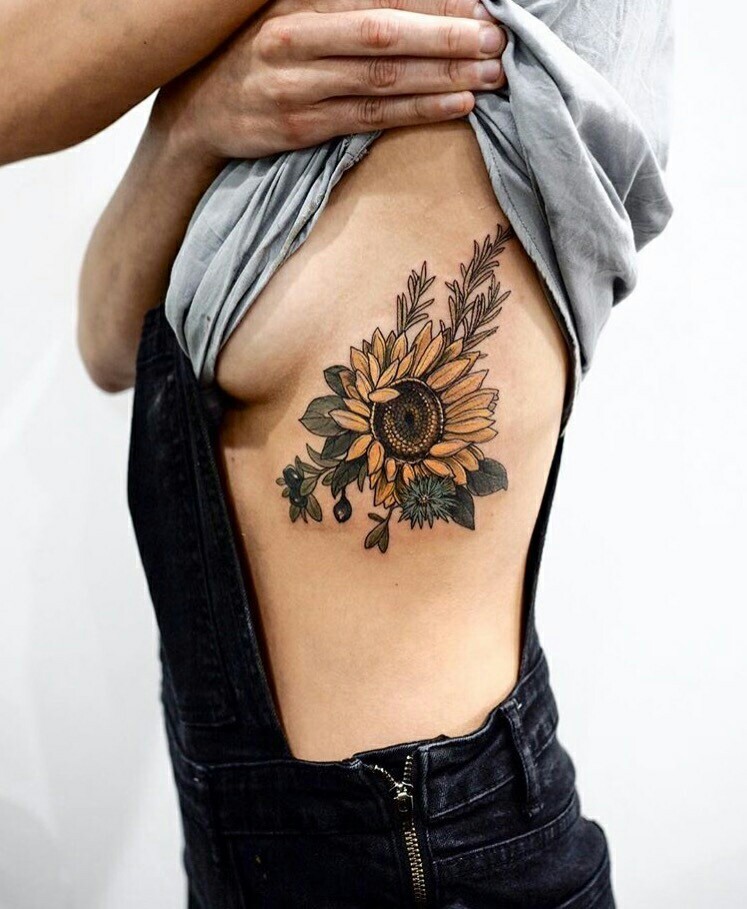 Elly Bordwell Tattoos  Sunflower shoulder cap     sunflower  minimal color leaves shouldercap tattoo ink art happiness yellow  fusionink  Facebook