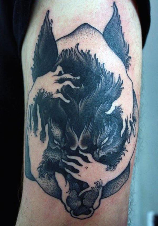 silver and red wolf tattoo