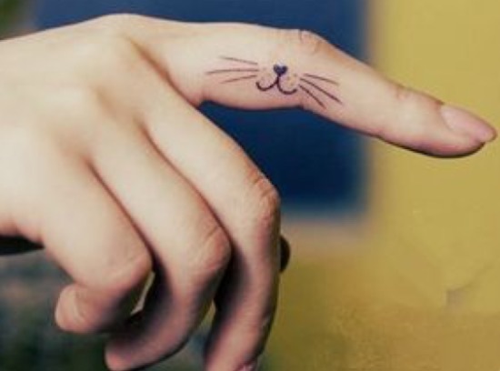 2. Small Mustache Finger Tattoo - wide 11