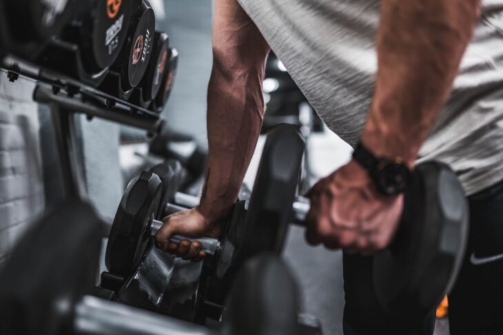 Man Working Out at a Gym
