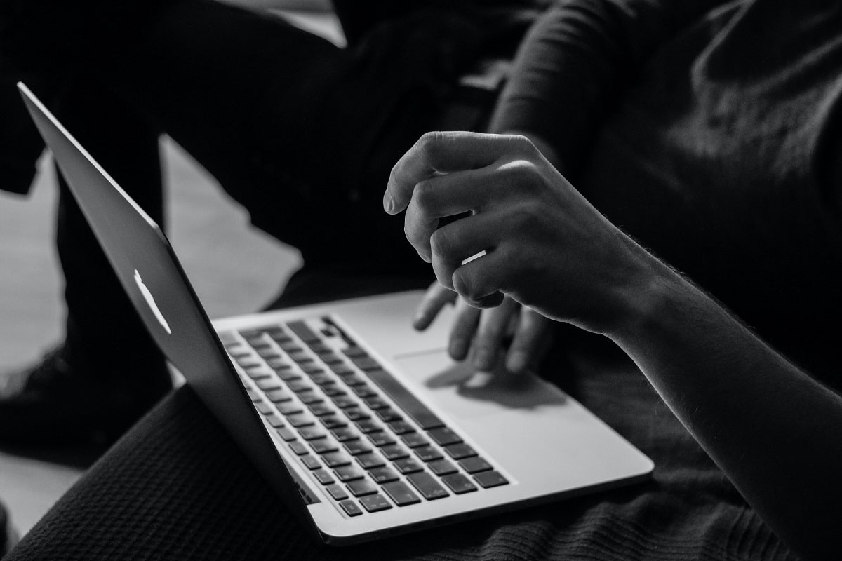 Man Using His Laptop to Shop Online