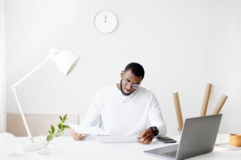 Man Working From Home While Wearing Glasses